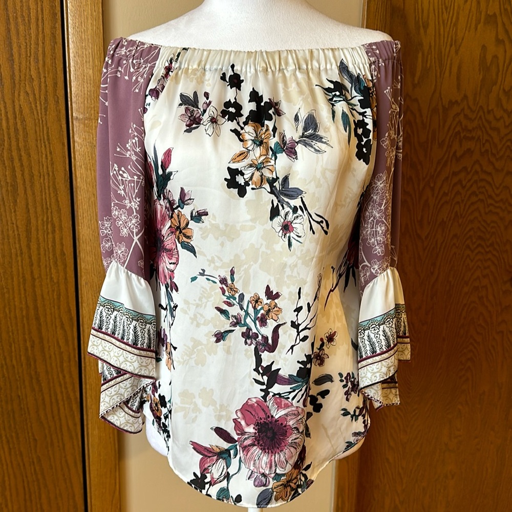 Set of two White House Black Market size small off-the-shoulder tops.
